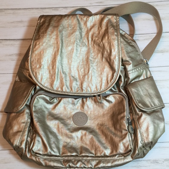 kipling gold metallic
